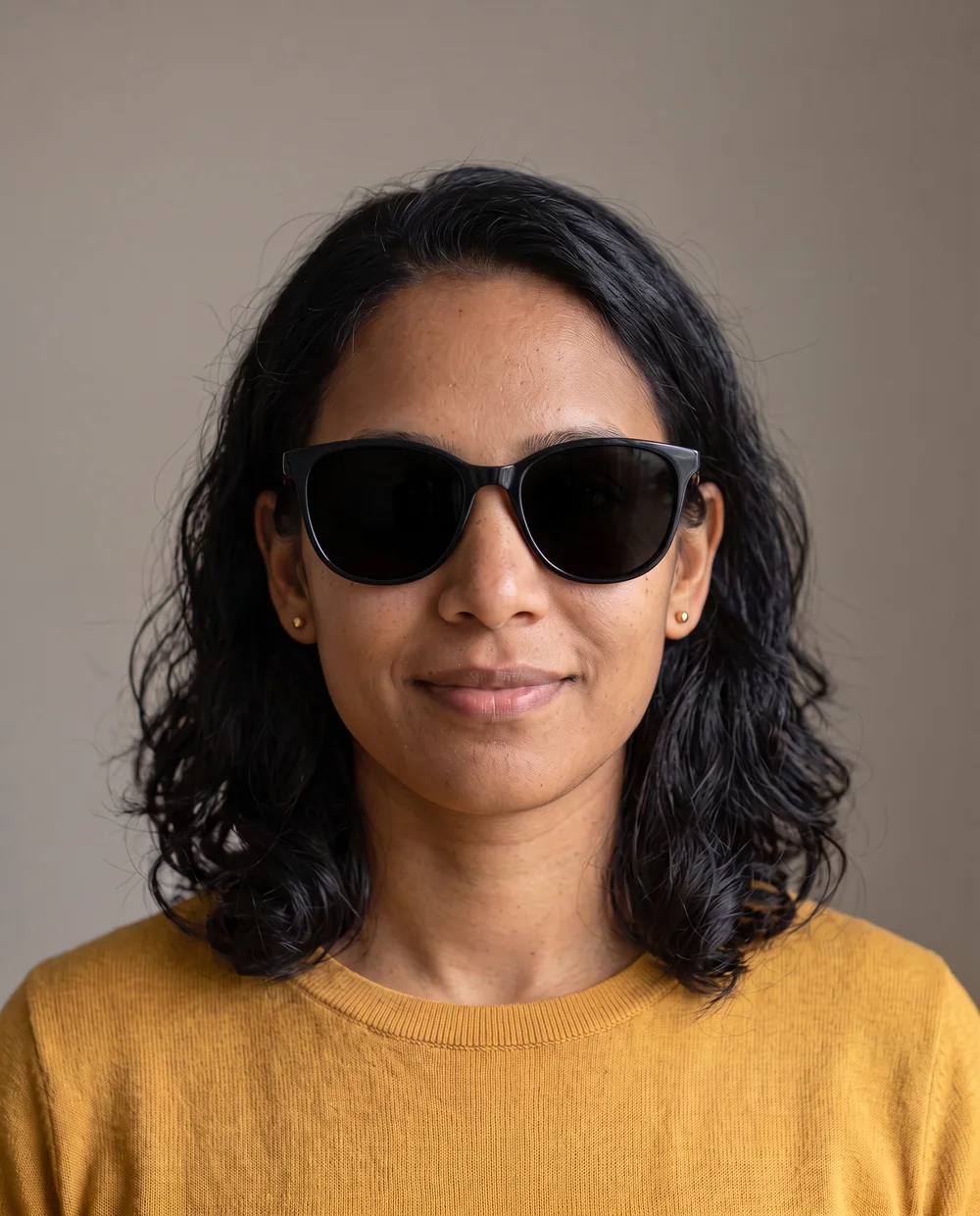 Simulated reference condition: Sunglasses or an object over the face hide cues you will later want to compare in the comic. Pick a photo without the obstruction.